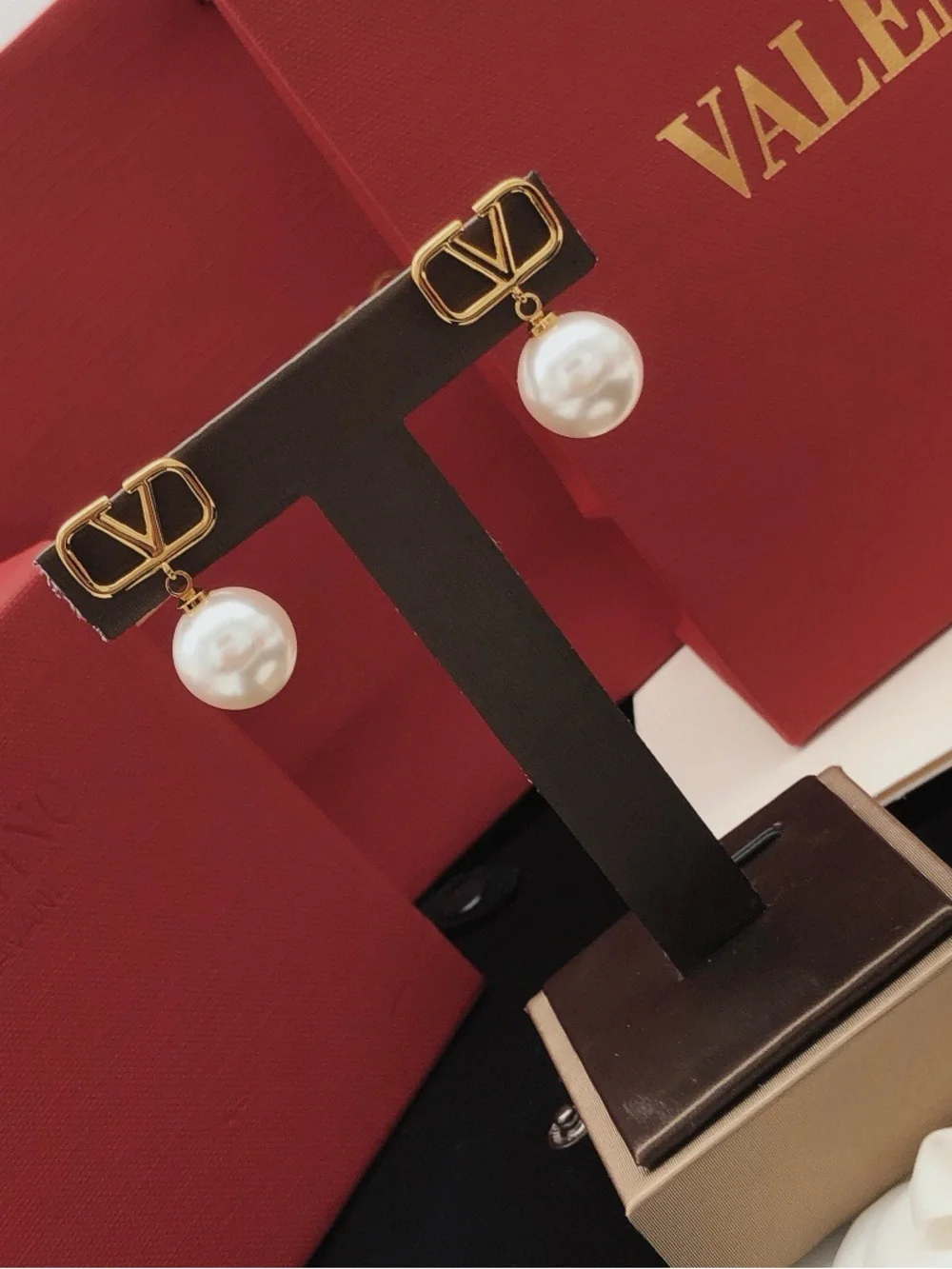 Valentino gold-tone V-logo drop earrings with ivory pearls